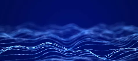 Light blue dots forming a wave-like pattern against a dark blue background